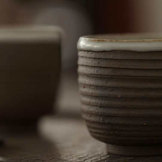Handmade Japanese-style 35ml retro pottery teacup with white glaze and raw ceramic finish – artisan collectible cup for Beirut drinkware lovers
