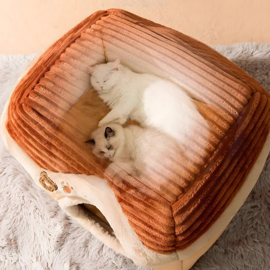 Two white cats peacefully sleeping inside a plush pet house with a soft brown roof, designed by European House Hold for cozy indoor lounging