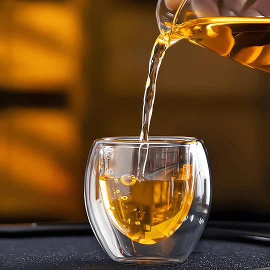 Hand holding super mini double wall espresso glass 150ml