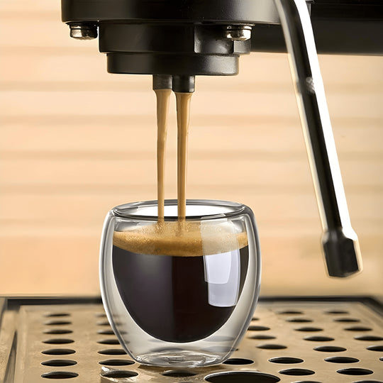 Hand holding super mini double wall espresso glass 150ml