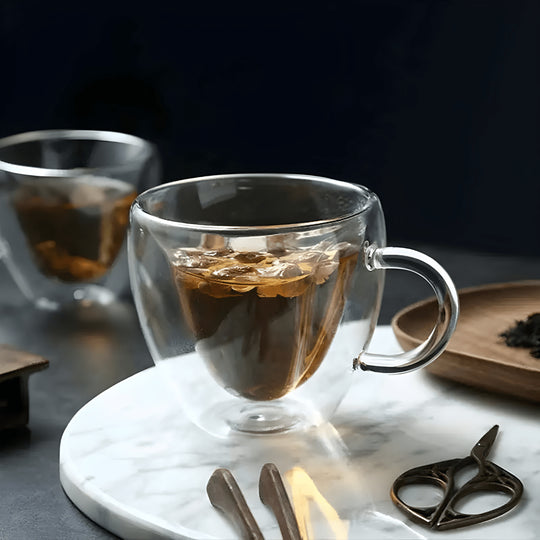 Heart-shaped glass mug filled with red herbal tea – 350ml