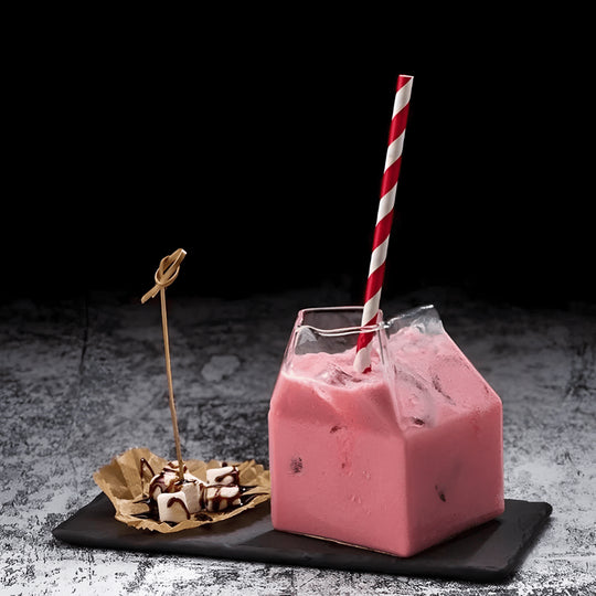 Milk box shaped clear glass cup filled with milk – Beirut, Lebanon