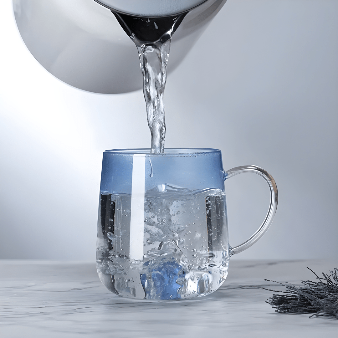 Transparent borosilicate glass cups with pink and blue heart designs, featuring gradient color and elegant handles – 400ml capacity.