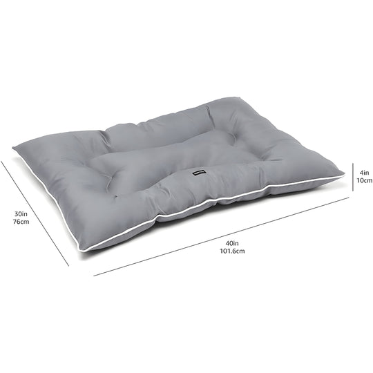 Large Amazon Basics water-repellent pet pillow bed with dog resting