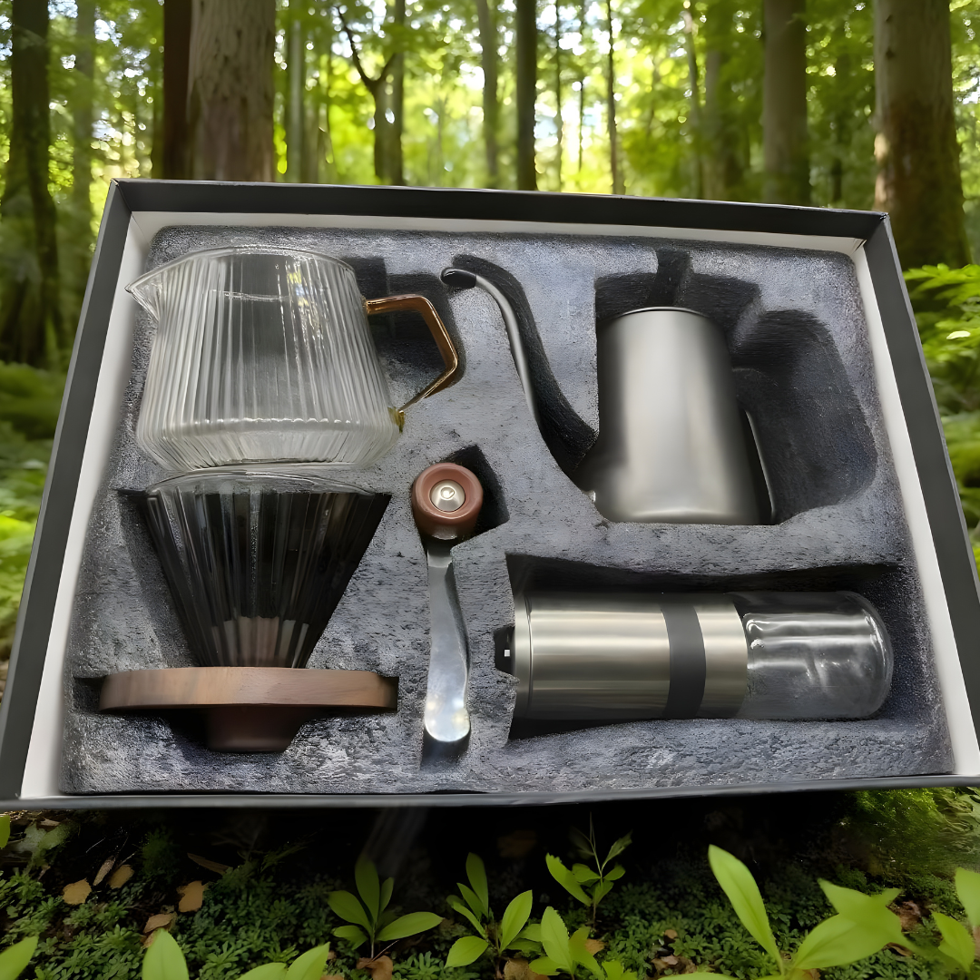 Premium pour-over coffee set with kettle, grinder, dripper, and accessories in gift box.
