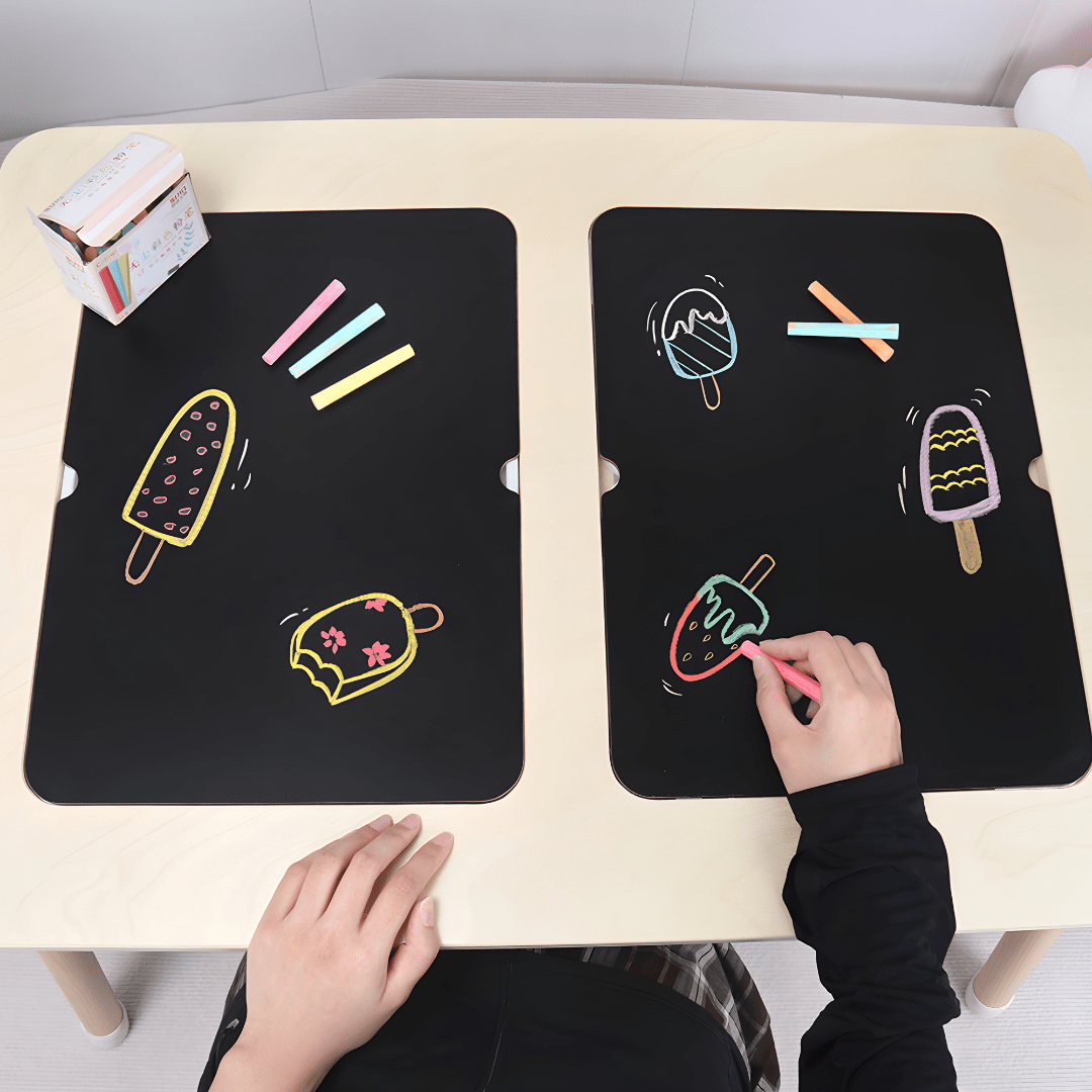 Montessori birch wood kids sensory activity table with storage bins and black-and-white drawing surface – available in Beirut, Lebanon.