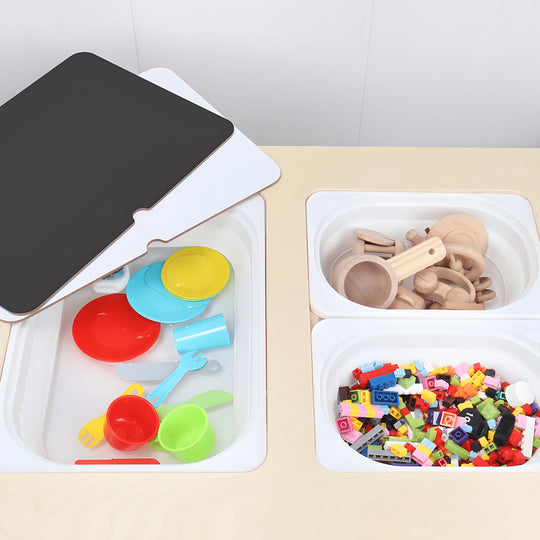 Montessori birch wood kids sensory activity table with storage bins and black-and-white drawing surface – available in Beirut, Lebanon.