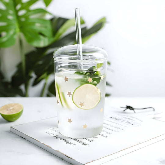 500ml borosilicate glass cups with lids and reusable straws, featuring trendy prints like bear, flamingo, and stars – perfect for iced coffee, juices, and smoothies in Beirut’s vibrant lifestyle.