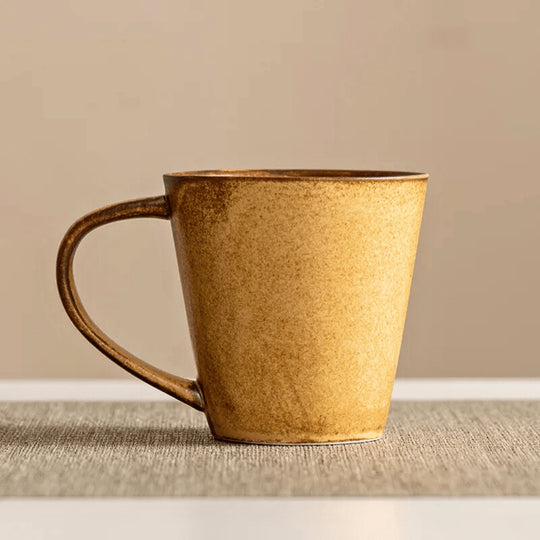 300ml rustic vintage ceramic mug with and without saucer – warm-toned coffee cup perfect for home or office use.