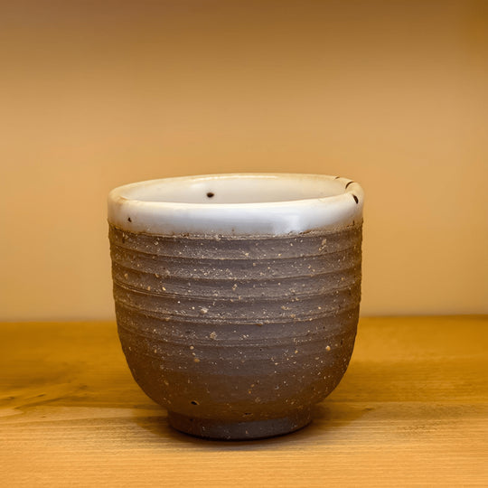 Handmade Japanese-style 35ml retro pottery teacup with white glaze and raw ceramic finish – artisan collectible cup for Beirut drinkware lovers