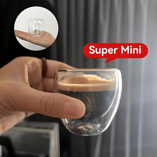 Hand holding super mini double wall espresso glass 150ml