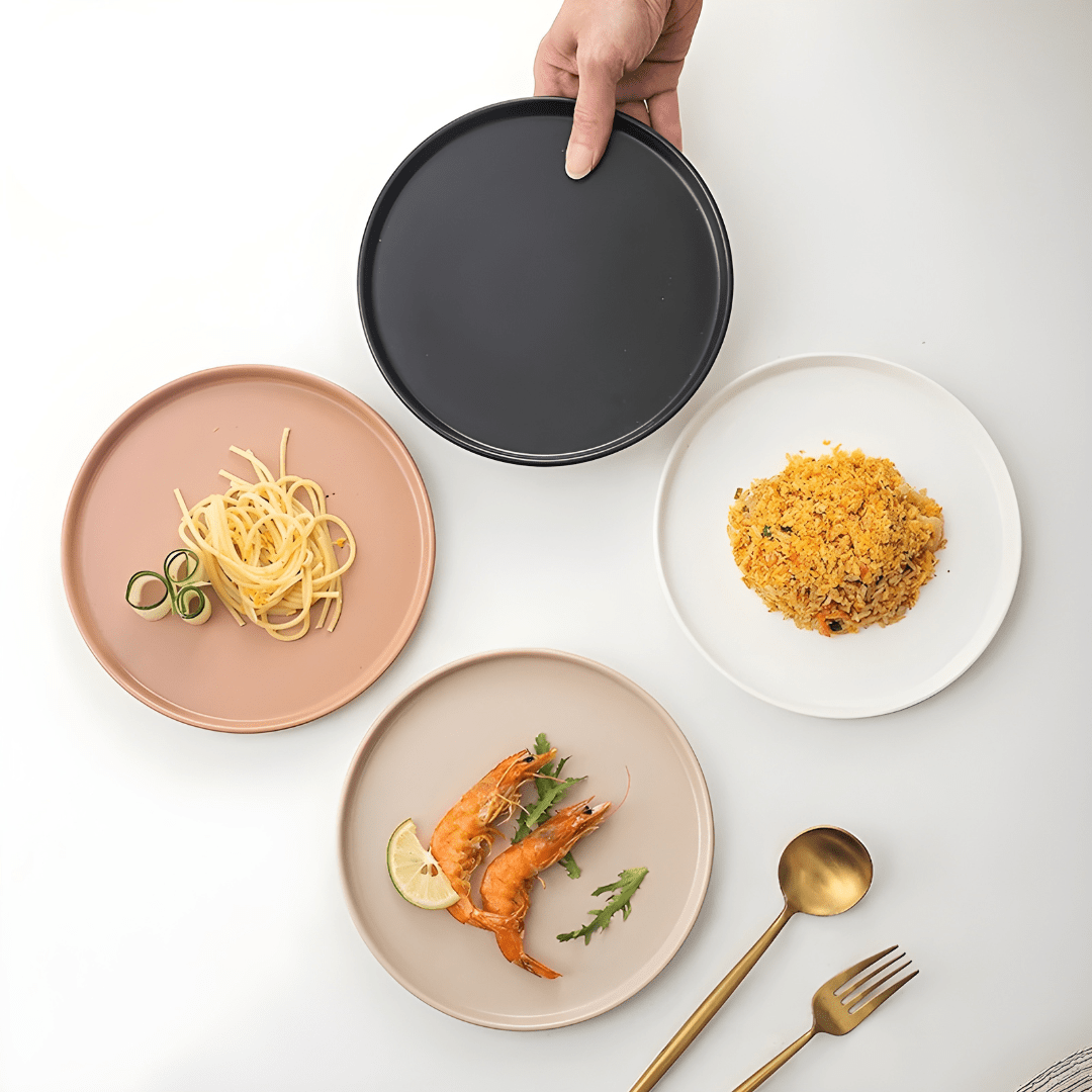 Elegant matte finish dinner plate in white and red-brown, modern minimalist design, available in Lebanon, durable and safe for microwave & dishwasher.