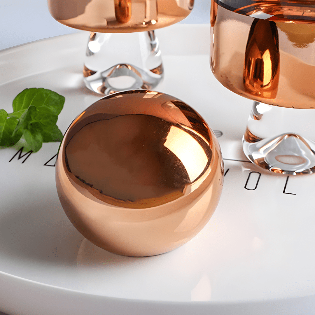 Minimalist modern glass decanter with ball stopper and two electroplated glasses