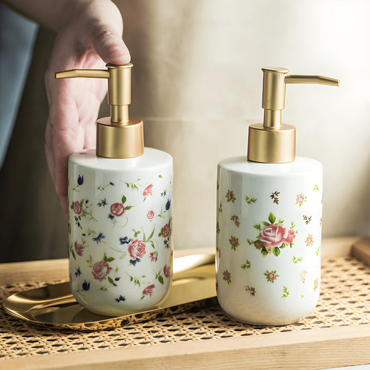Retro white soap dispenser with golden pump and rose design – Beirut Lebanon