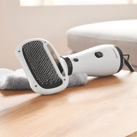 Zoofari 2-in-1 pet dryer with brush, 300W quiet grooming tool with rounded stainless steel bristles, gently dries and detangles all coat types.