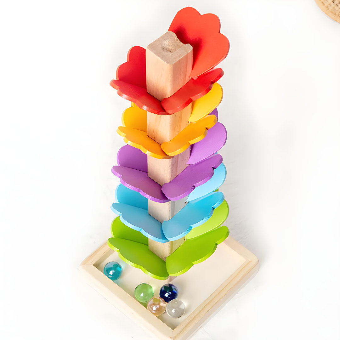 Montessori wooden marble tree toy with colorful leaves and marbles in the base, for ages 3+