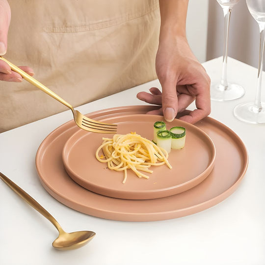 Elegant matte finish dinner plate in white and red-brown, modern minimalist design, available in Lebanon, durable and safe for microwave & dishwasher.