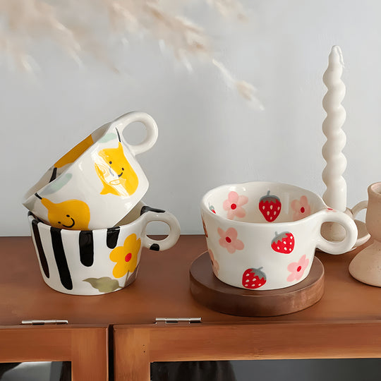 Hand-painted 280ml cartoon ceramic mugs in lemon, strawberry, and floral designs – fun and colorful tableware