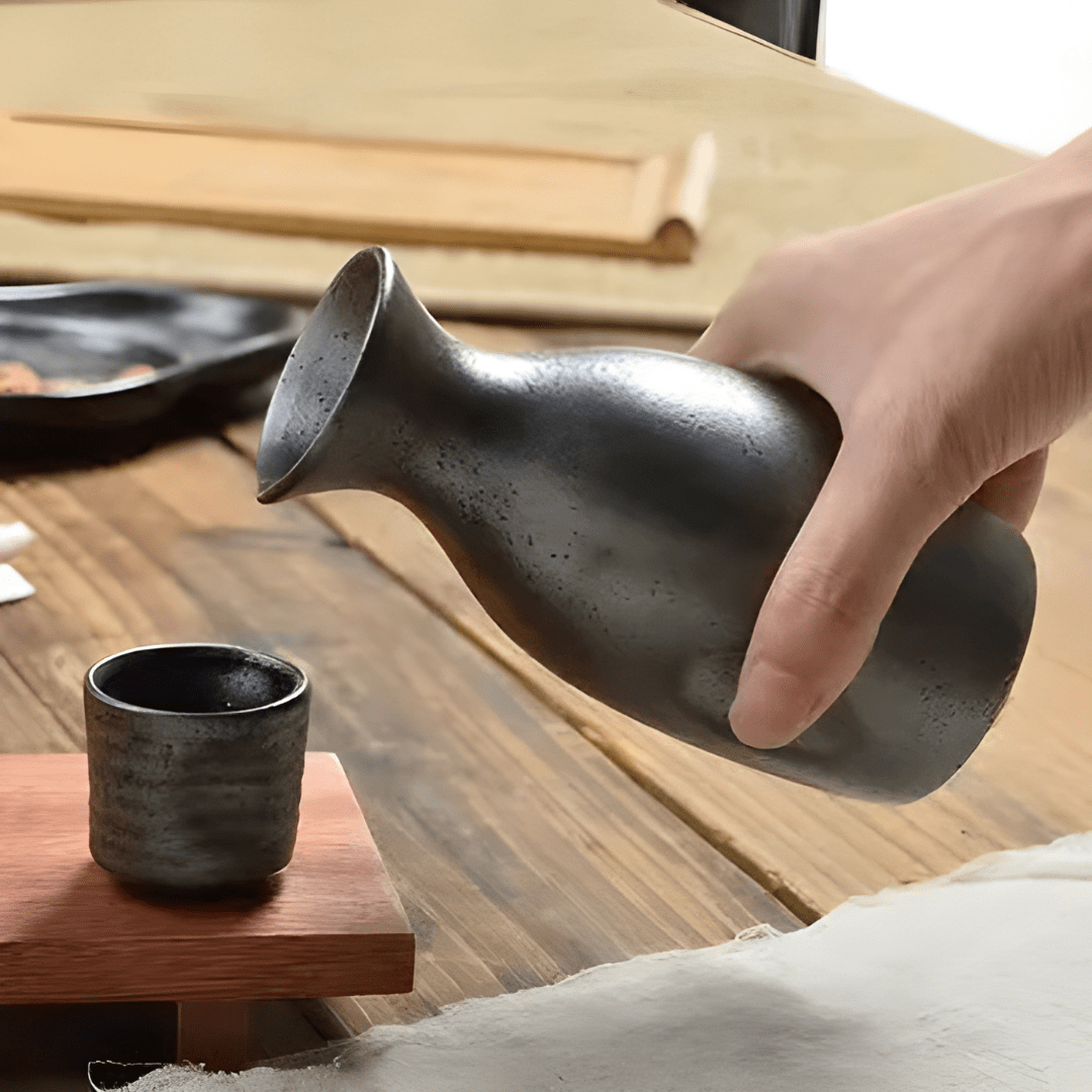 Porcelain sake bottle with matching cup, 300ml + 30ml set, fired at high temperature, suitable for tea, wine, or home bar display.