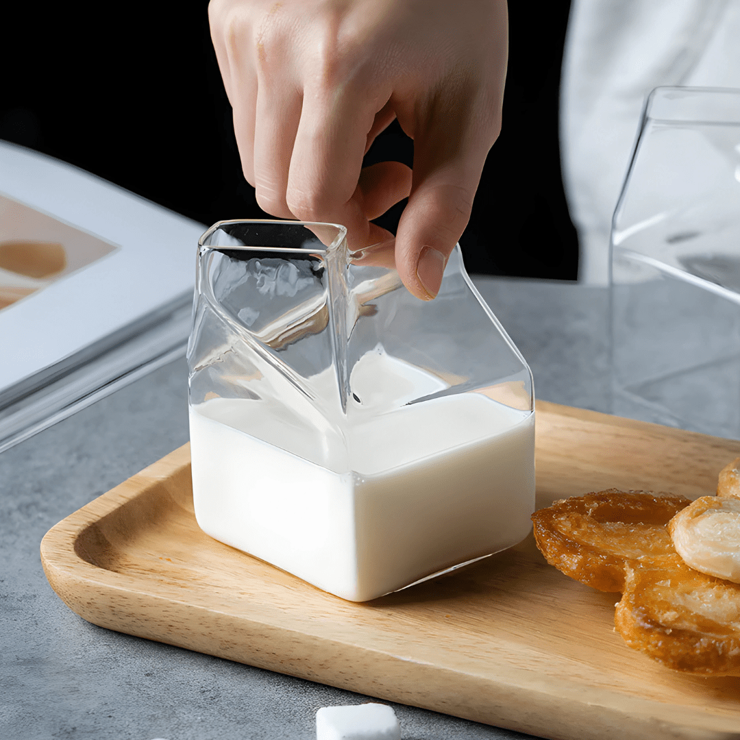Milk box shaped clear glass cup filled with milk – Beirut, Lebanon