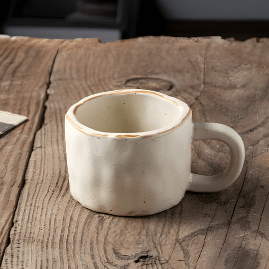 200ml Japanese-style hand-pinched ceramic mug with rustic finish, ideal for coffee or tea

