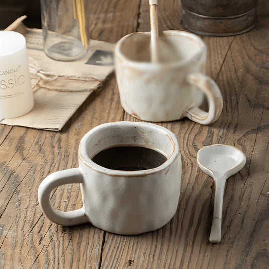200ml Japanese-style hand-pinched ceramic mug with rustic finish, ideal for coffee or tea

