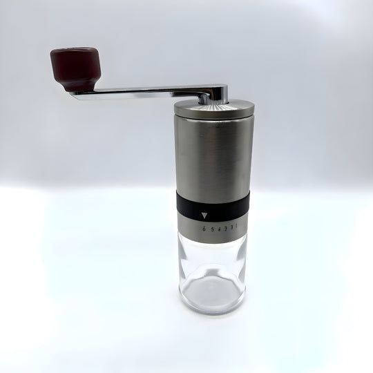 Premium pour-over coffee set with kettle, grinder, dripper, and accessories in gift box.