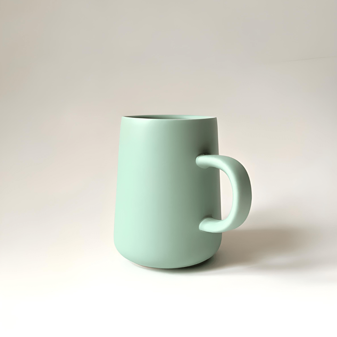 Scandinavian-style 340ml matte ceramic mugs in green, blue, and dark blue colors