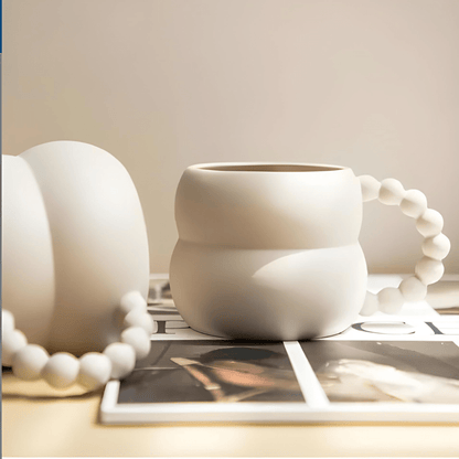 Beige minimalist ceramic mug with beaded handle – European Household Lebanon