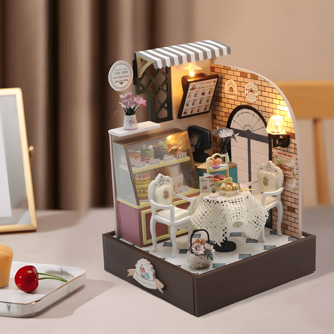 Completed Sweet Cake Station miniature cake shop with warm lighting