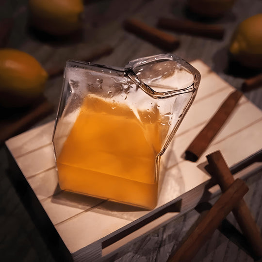 Milk box shaped clear glass cup filled with milk – Beirut, Lebanon