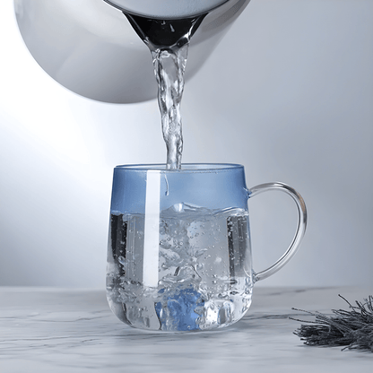 Transparent borosilicate glass cups with pink and blue heart designs, featuring gradient color and elegant handles – 400ml capacity.