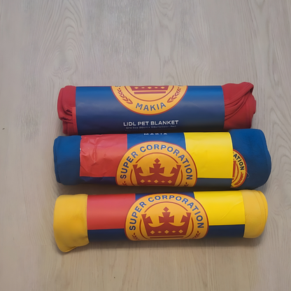 Soft fleece pet blanket in red, blue, and yellow – ideal for dogs, car protection, and cozy snuggles.