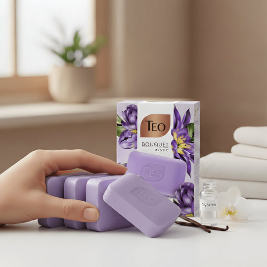 Teo Bouquet Mystic purple bar soaps with vanilla essence and glycerin on a clean white surface with spa towels.