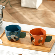 400ml hand-printed ceramic mug with leaf handle and artistic face design – Beirut Lebanon