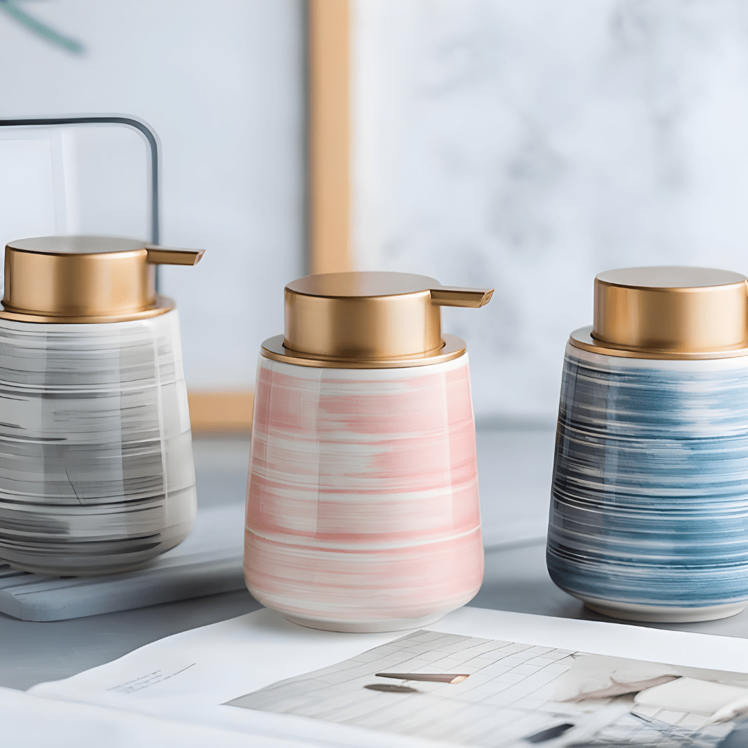 Matte white Nordic ceramic shampoo dispenser 430ml with silver pump on a modern bathroom shelf.