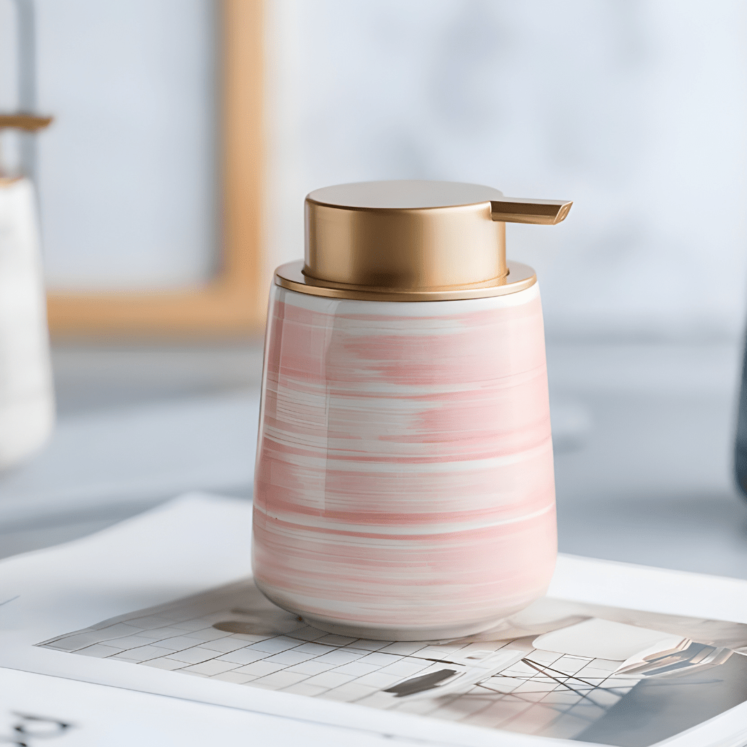 Matte white Nordic ceramic shampoo dispenser 430ml with silver pump on a modern bathroom shelf.