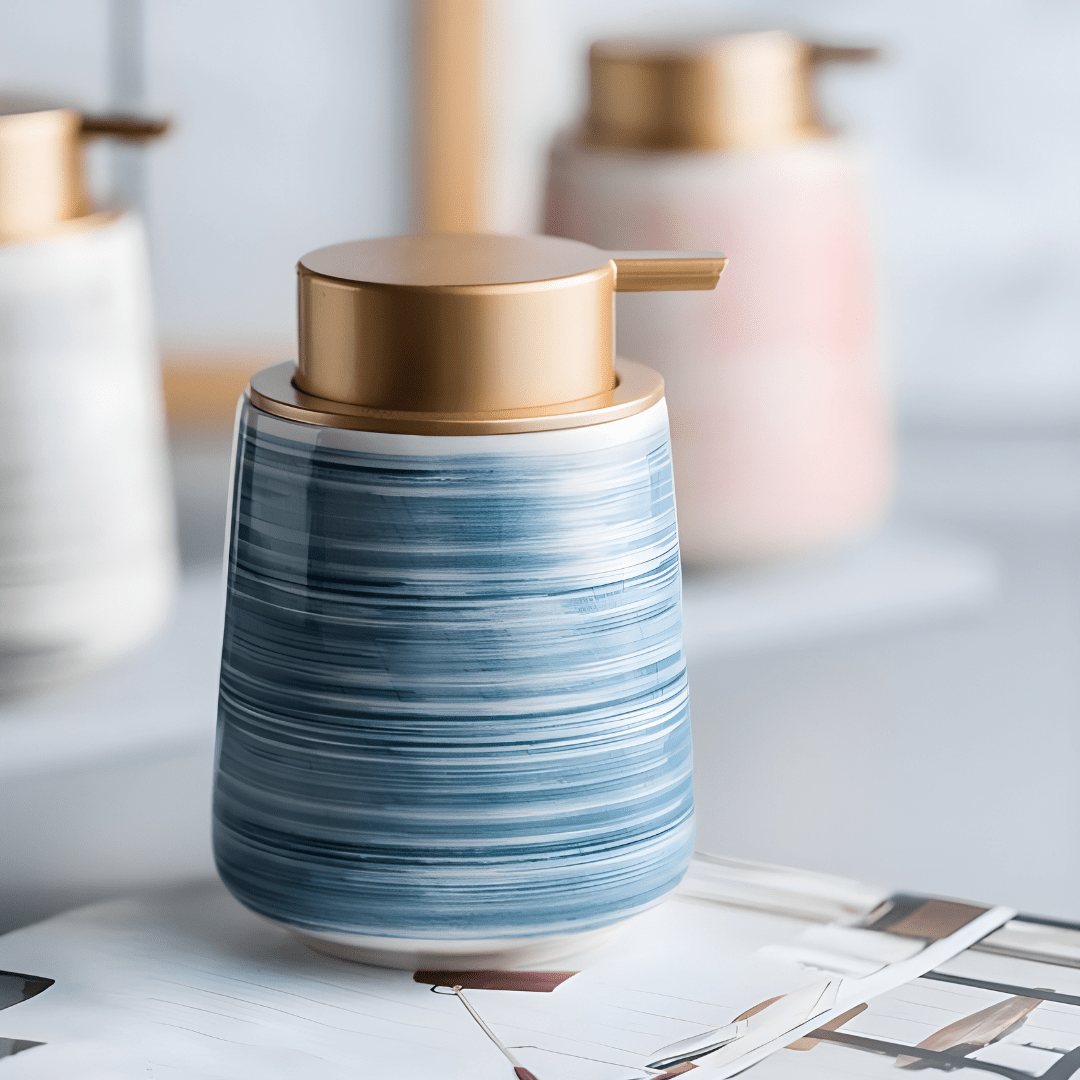 Matte white Nordic ceramic shampoo dispenser 430ml with silver pump on a modern bathroom shelf.