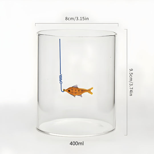 Hand-blown 400ml drinking glass with suspended fish-on-hook design, available in blue or orange – perfect for Beirut homes.