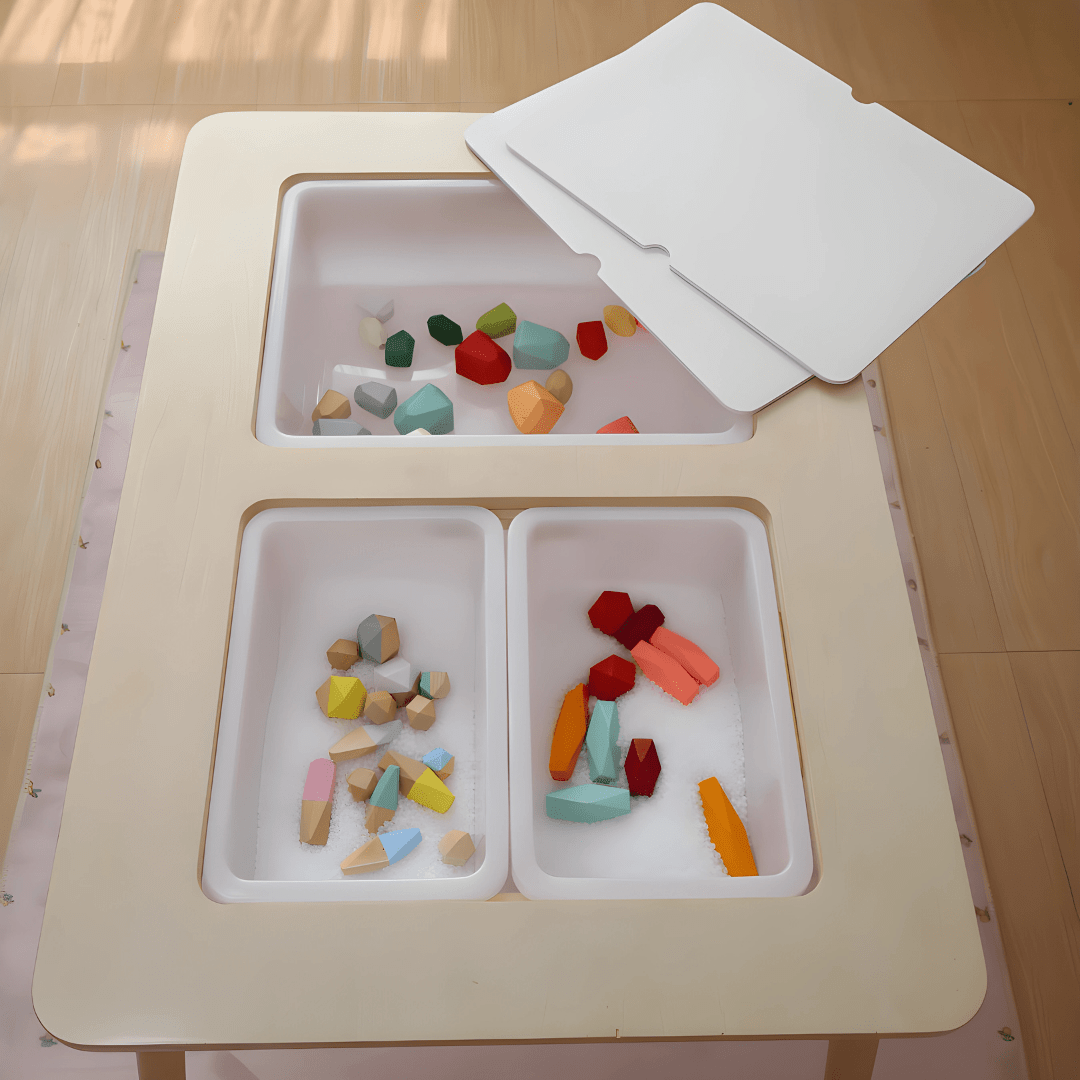 Montessori birch wood kids sensory activity table with storage bins and black-and-white drawing surface – available in Beirut, Lebanon.