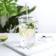 500ml borosilicate glass cups with lids and reusable straws, featuring trendy prints like bear, flamingo, and stars – perfect for iced coffee, juices, and smoothies in Beirut’s vibrant lifestyle.