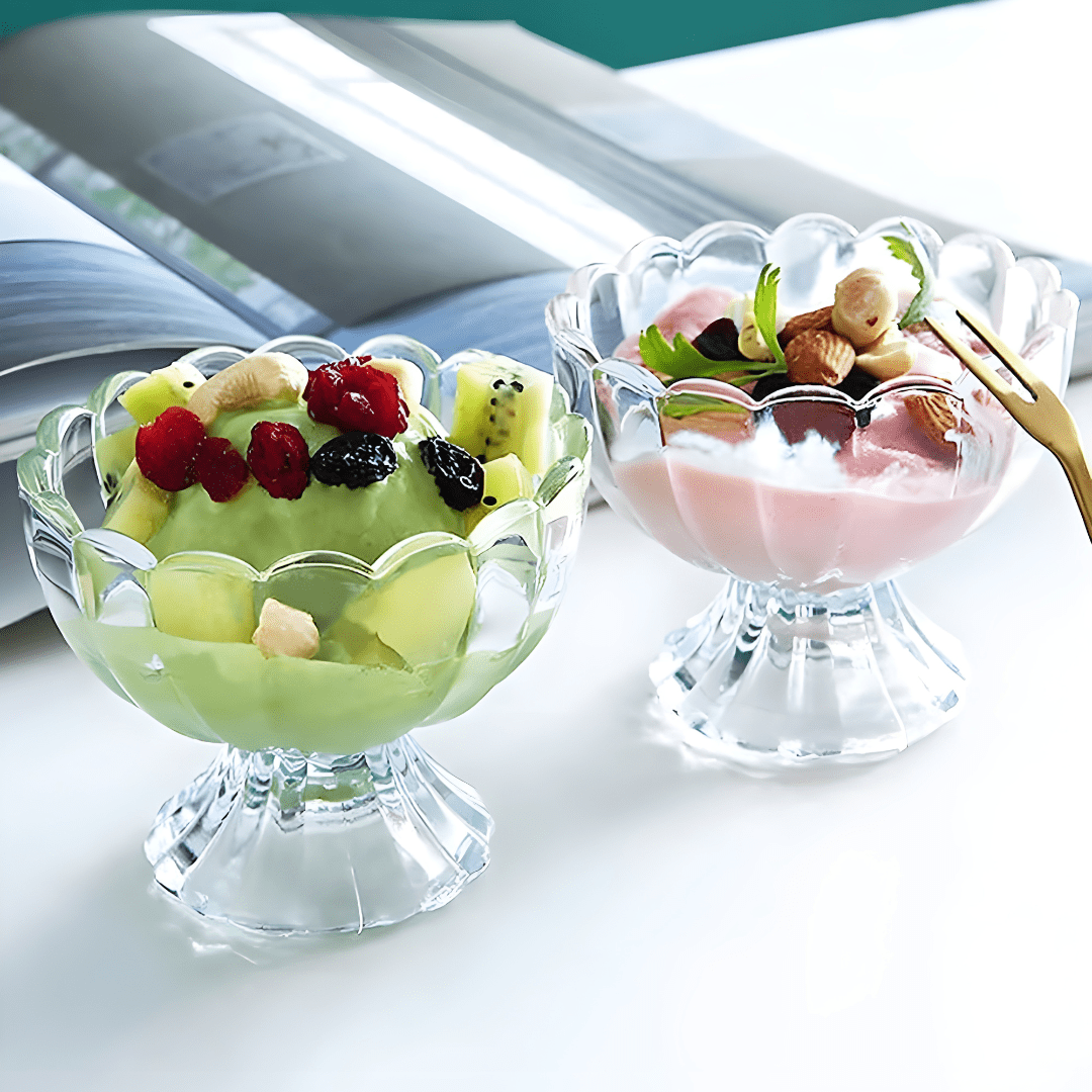 Clear glass dessert bowls with elegant scalloped design, ideal for serving ice cream, fruit, or Lebanese Meghle desserts.

