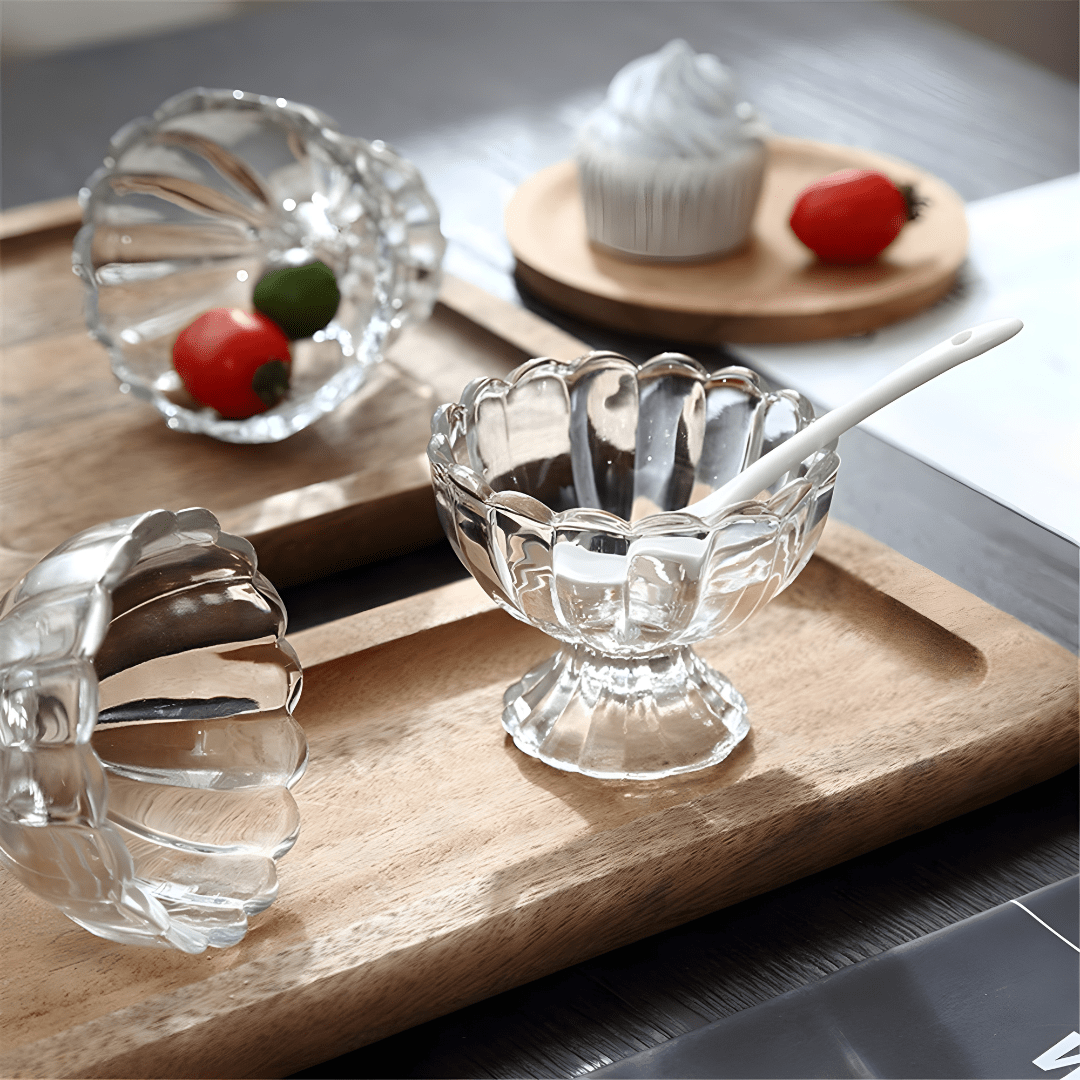 Clear glass dessert bowls with elegant scalloped design, ideal for serving ice cream, fruit, or Lebanese Meghle desserts.

