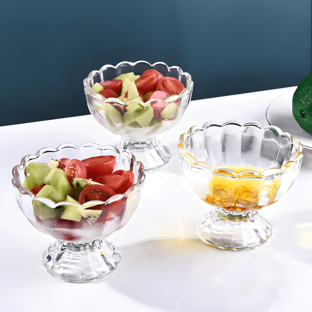Clear glass dessert bowls with elegant scalloped design, ideal for serving ice cream, fruit, or Lebanese Meghle desserts.

