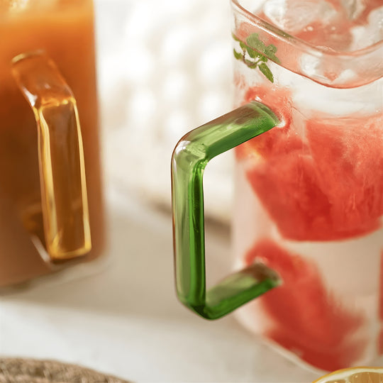 Handmade 400ml square glass mug with colorful handle – available in green, yellow, blue, and amber