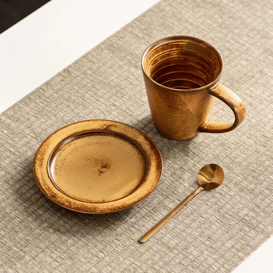 300ml rustic vintage ceramic mug with and without saucer – warm-toned coffee cup perfect for home or office use.