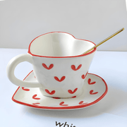 Heart-shaped porcelain mug with red heart pattern, matching saucer and gold spoon – 300ml cup set for coffee or tea
