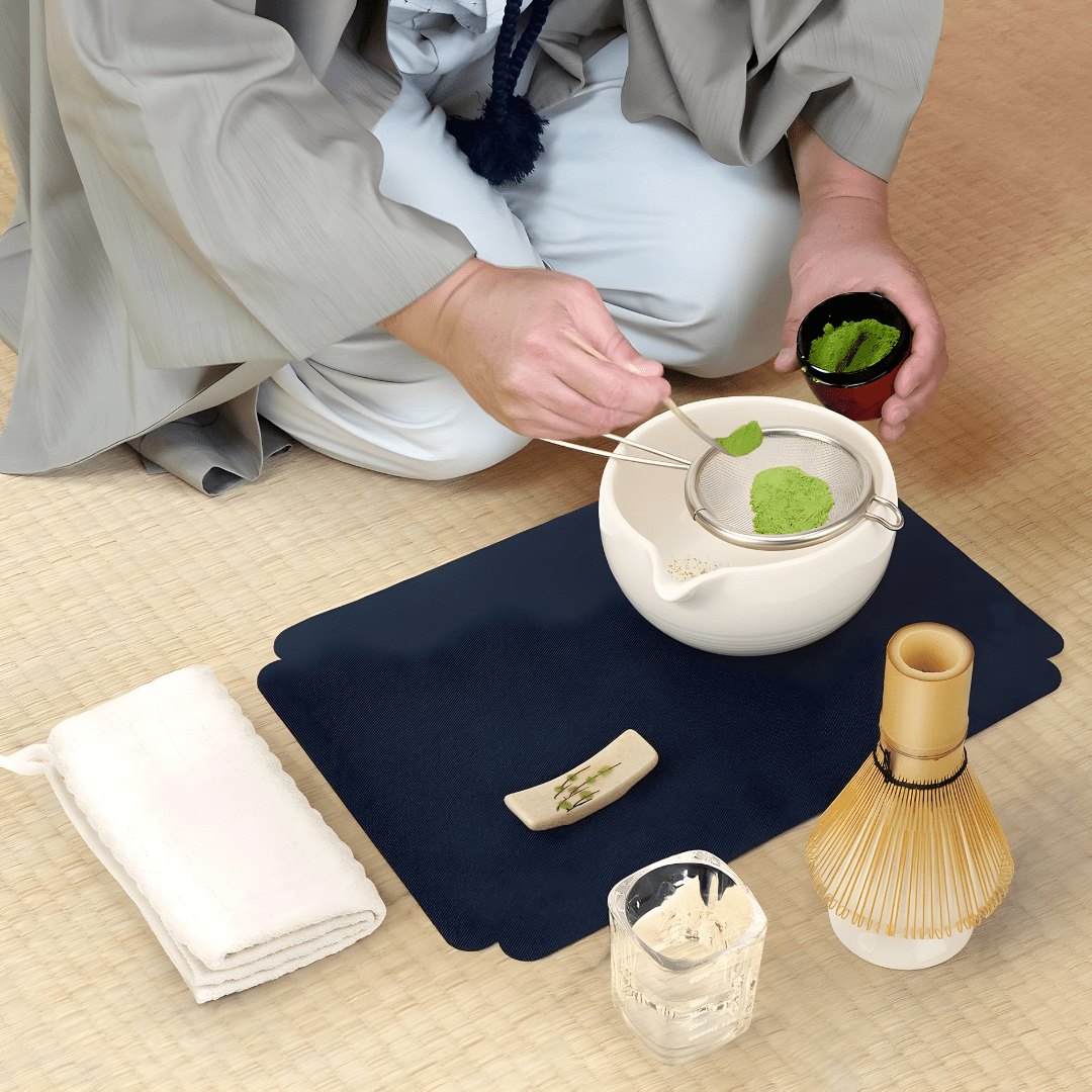 Premium 10-piece Matcha tea set with whisk, ceramic bowl, sifter, scoop, and accessories – secure packaging and traditional setup.