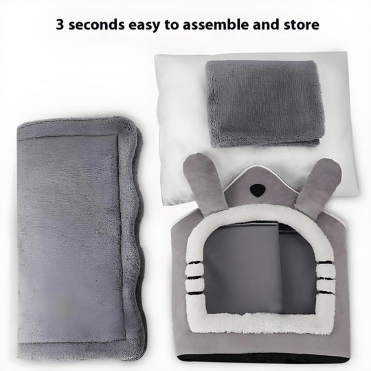 Grey plush dog and cat house with soft roof, detachable parts, non-slip bottom, and adorable cartoon ear design – available in S and L sizes.

