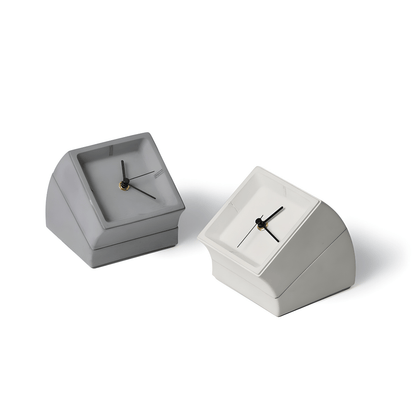 High-end minimalist concrete desk clock with matte finish and hidden storage, available in gray and white – sculptural design for luxury interiors
